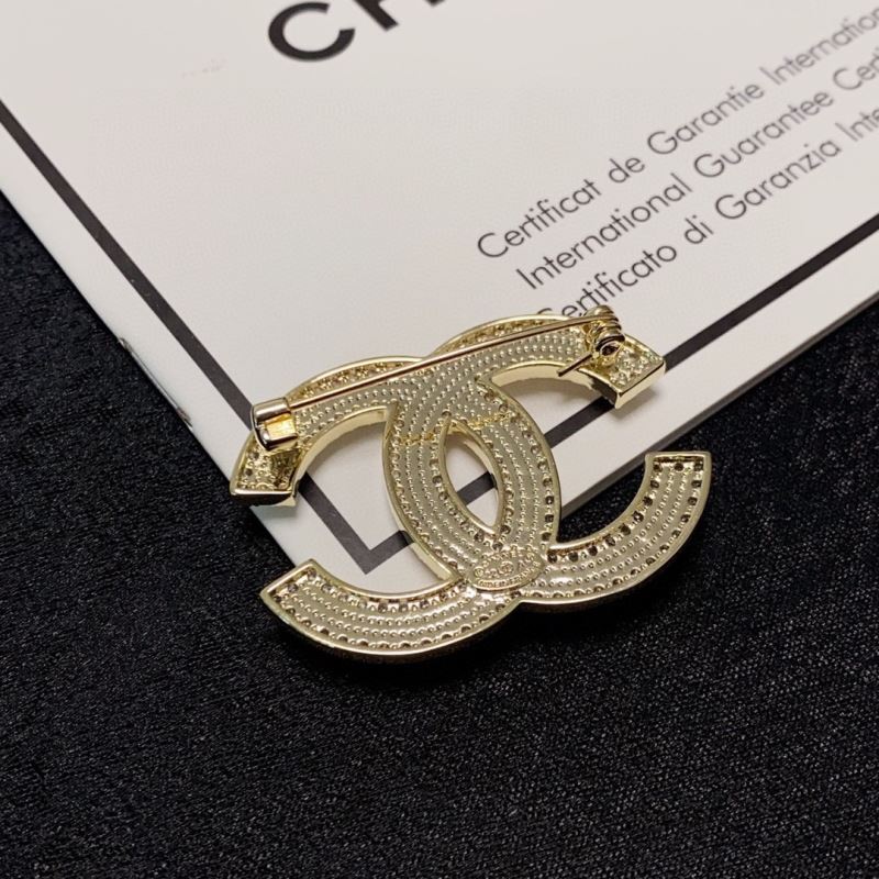 Ch**el brooches